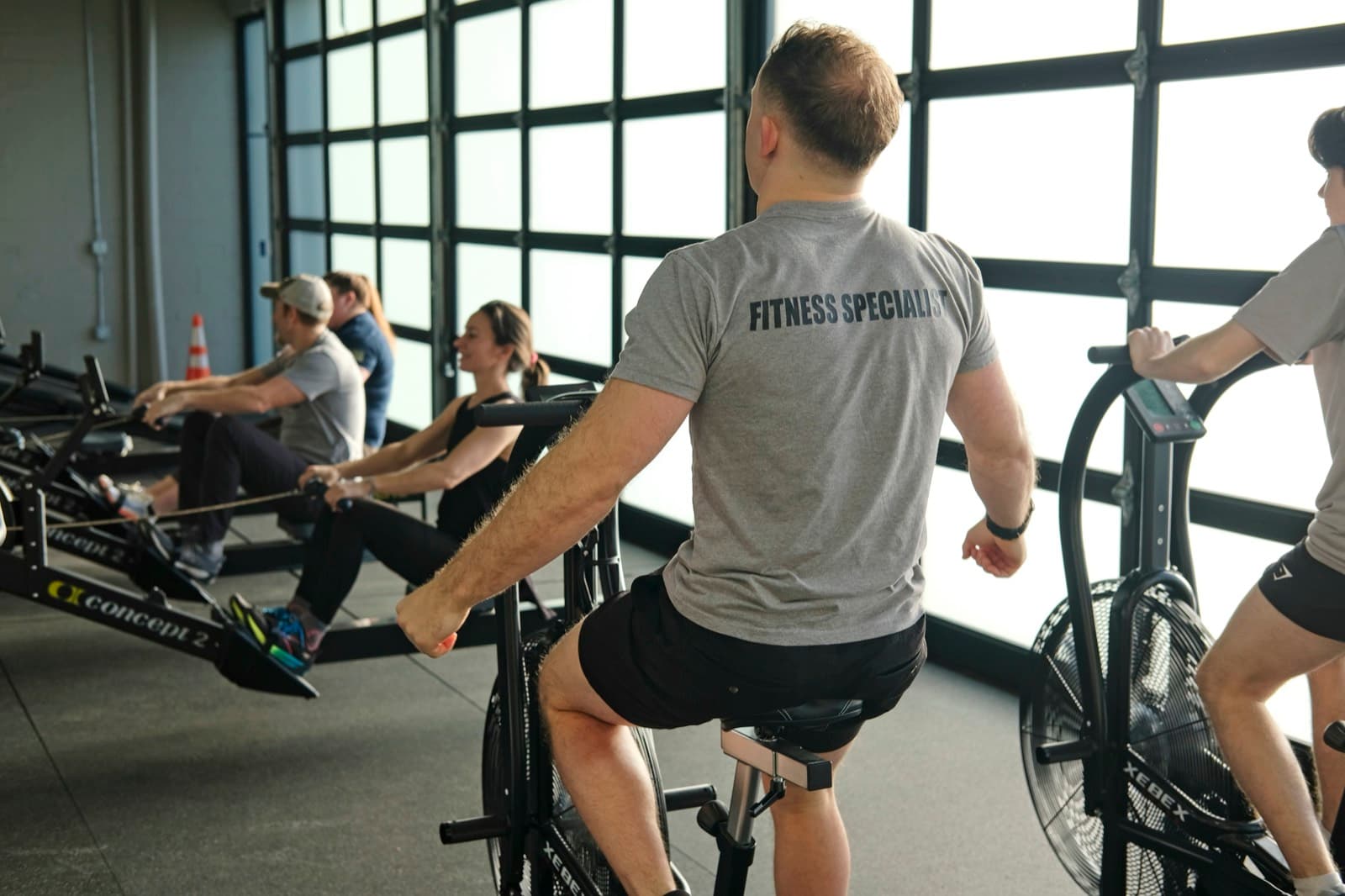 A member on an air bike during a conditioning session at Fitness 300
